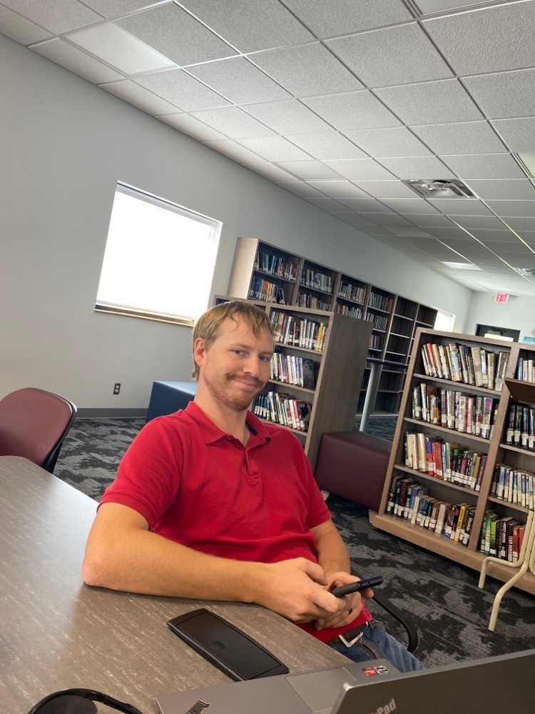 Patrick learning how to update the school website