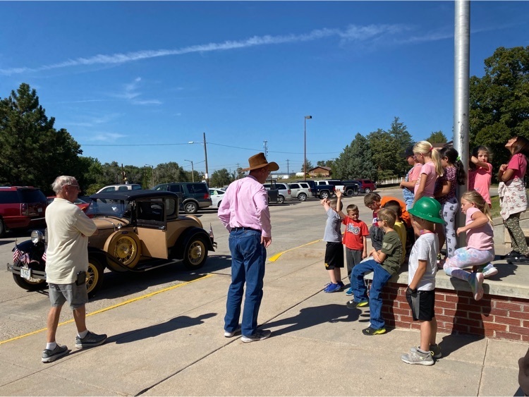 MR Bob Ellis sharing his car and knowledge with the 2nd Grade