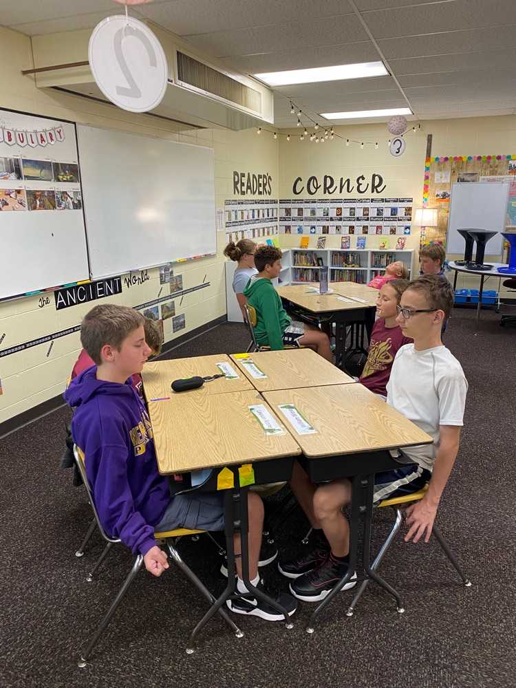 The sixth-graders practice relaxation and calming strategies with Mrs. Kliesen during their SEL time Friday afternoon. 